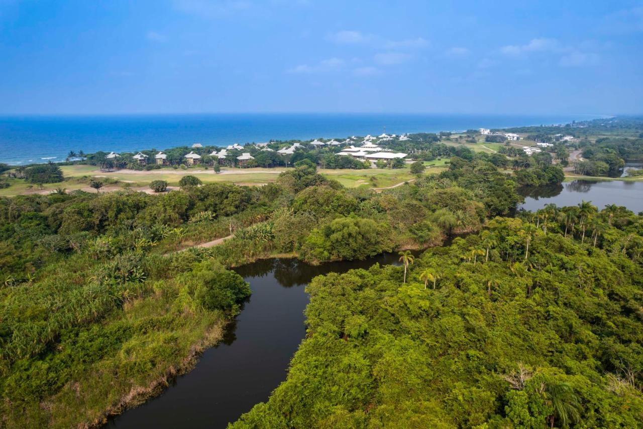 Indura Beach & Golf Resort Curio Collection By Hilton เตลา ภายนอก รูปภาพ